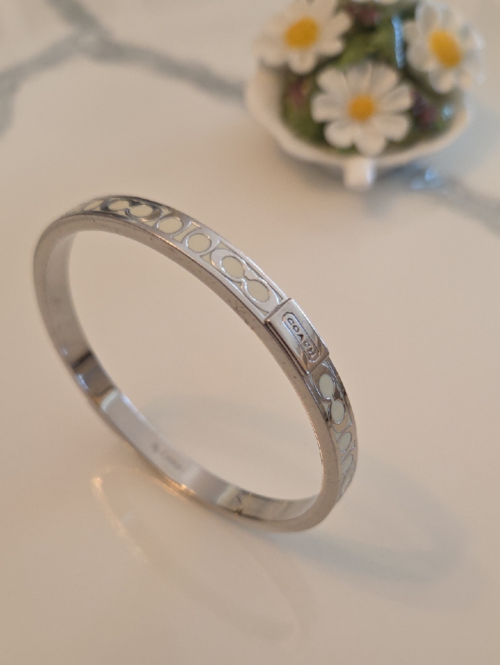 Coach Silver Tone Enamel Signature Hinged Bangle